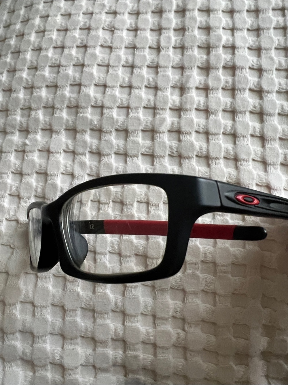Oakley Black Frame Glasses with Red Temples